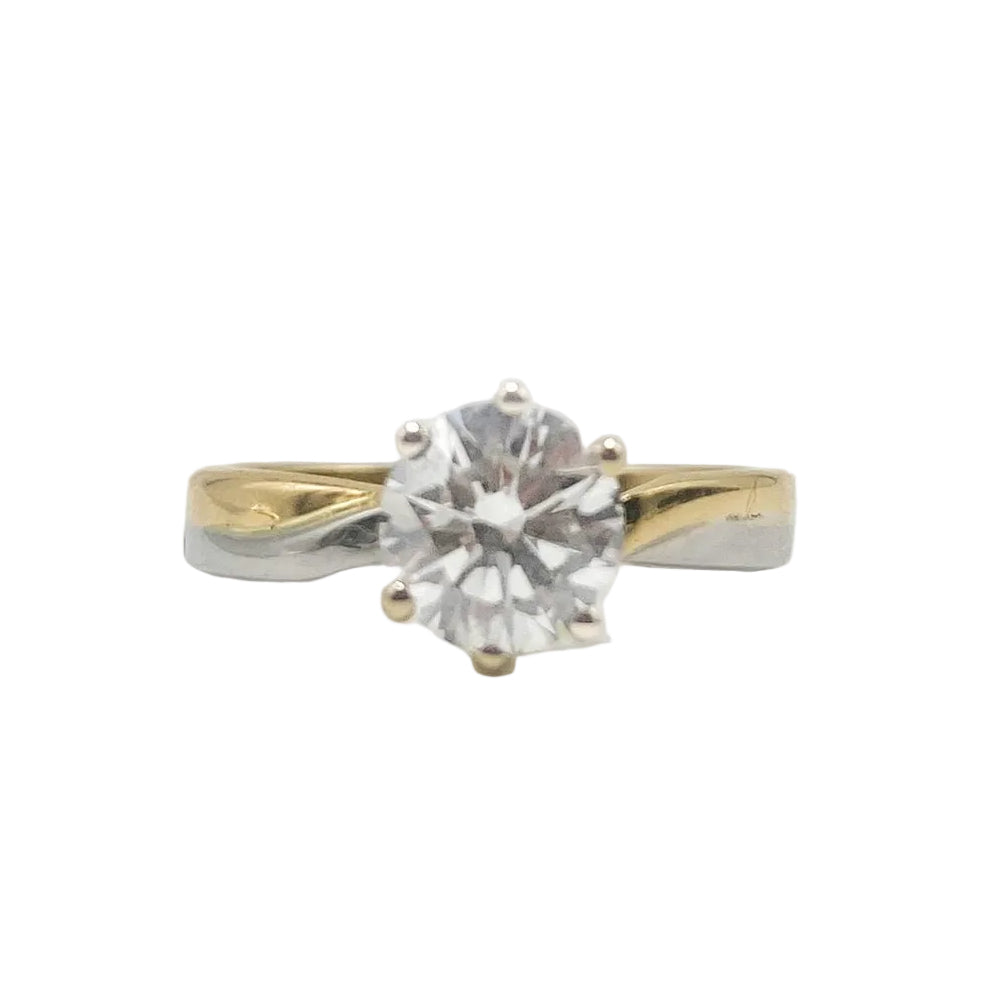 Solitaire Ring in White gold, Yellow gold, and Diamond