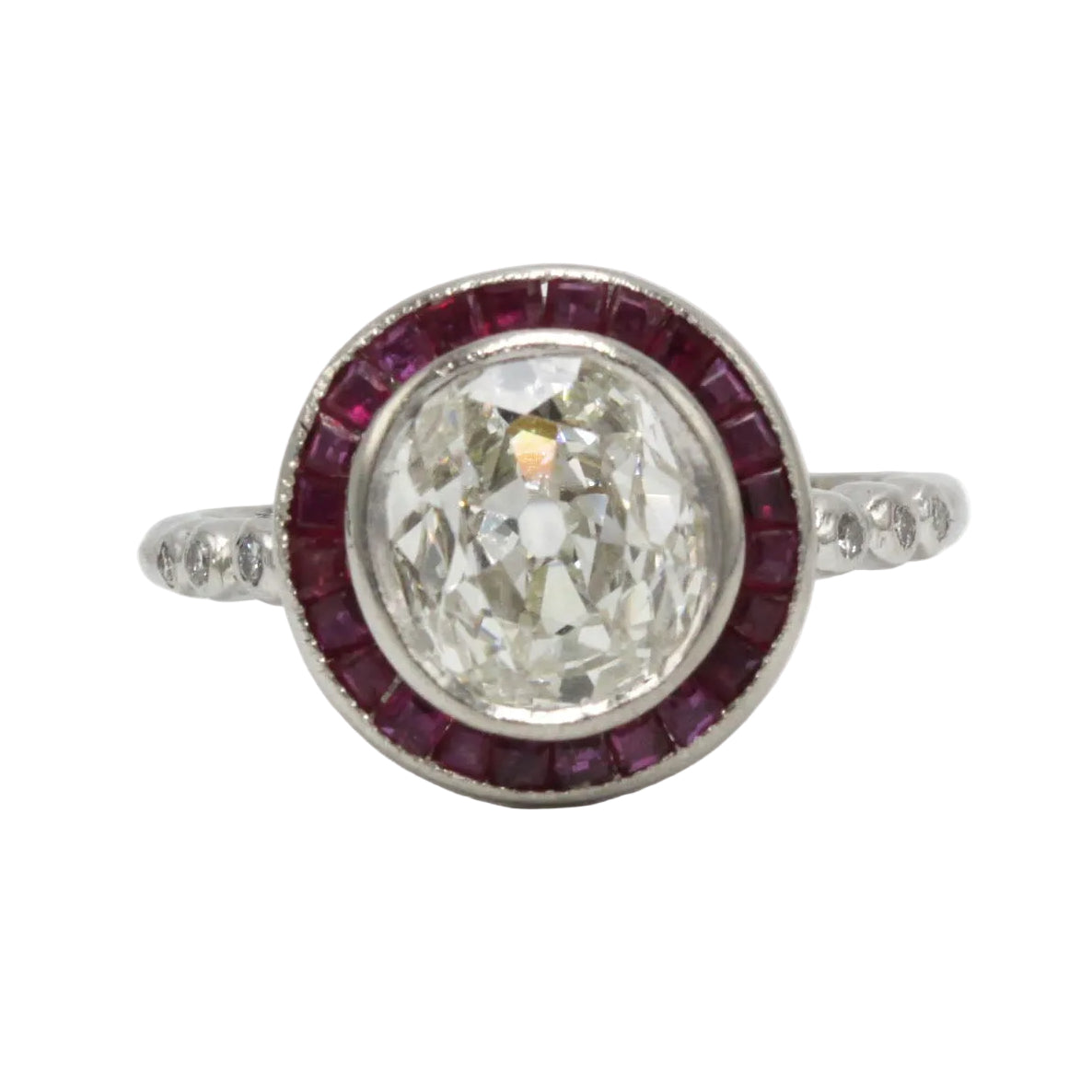 Entourage Ring in platinum, rubies, and diamonds