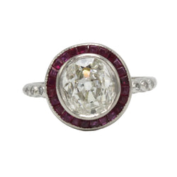 Entourage Ring in platinum, rubies, and diamonds