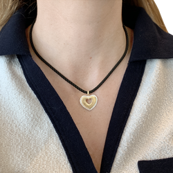 Pendentif Poiray "Coeur Secret" en deux tons d'ors et diamants.