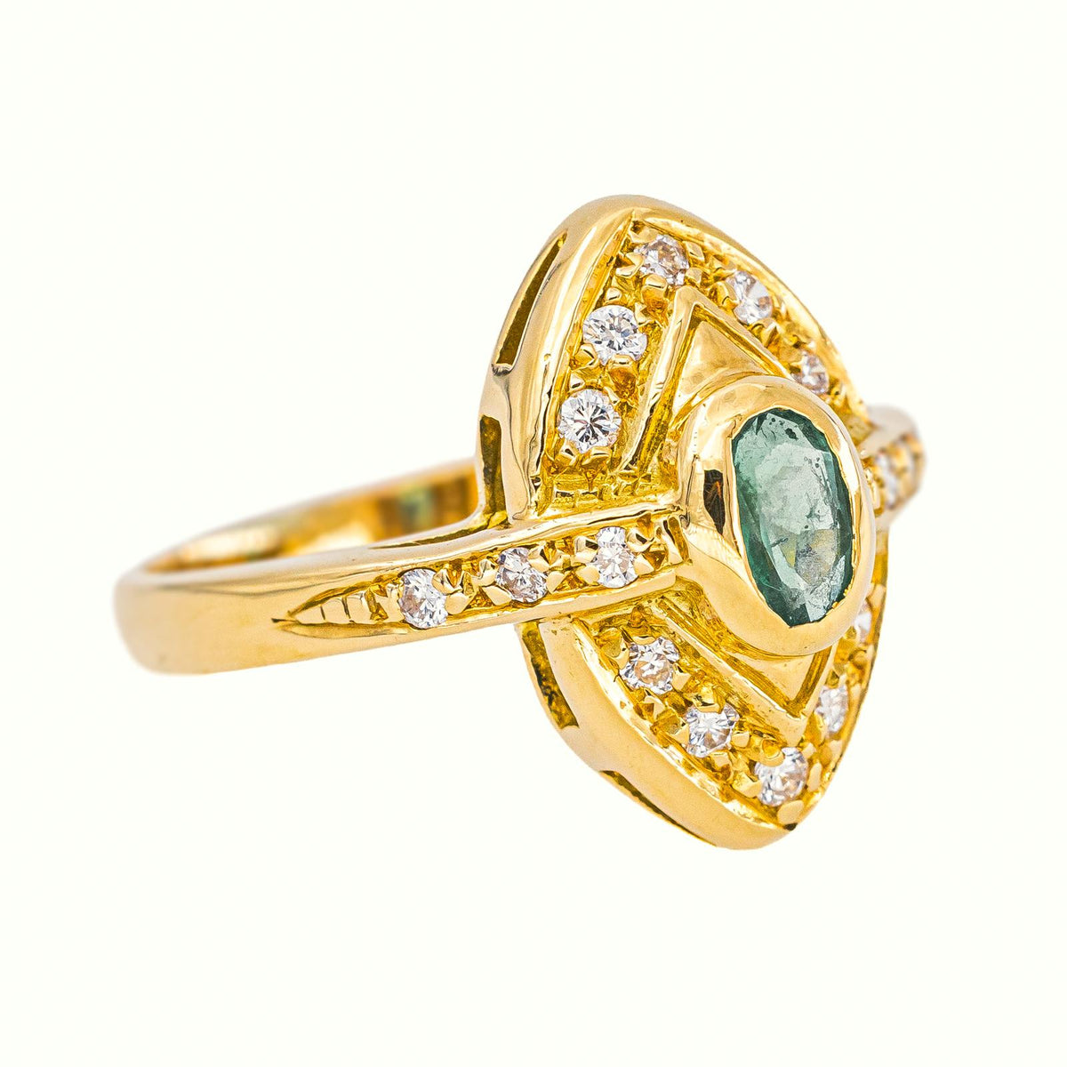 Marquise Ring in Yellow Gold with an Emerald