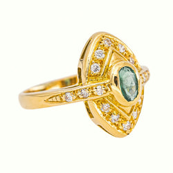 Marquise Ring in Yellow Gold with an Emerald