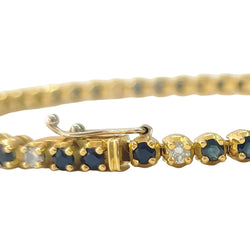"Ligne" Bracelet in Yellow Gold, Sapphires, and Diamonds
