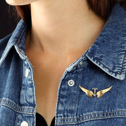 Yellow gold, silver, and diamond brooch