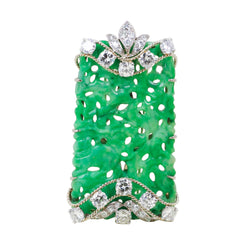 CARTIER Clip Brooch in white gold, platinum, jade, and diamonds