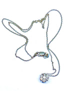 Chaine et pendentif en or blanc 18 carats serti de 7 diamants - Castafiore