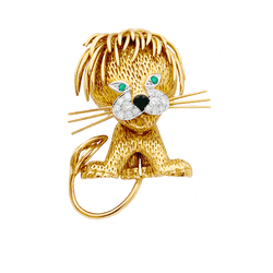 Clip VAN CLEEF & ARPELS, "Lion Ebouriffé" en or jaune, émeraude et diamants - Castafiore