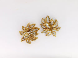 Clips d’oreilles vintage fleur en or et diamants - Castafiore