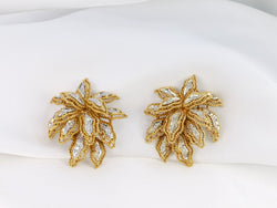 Clips d’oreilles vintage fleur en or et diamants - Castafiore