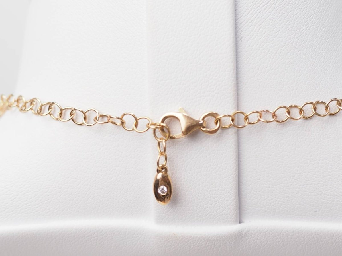 Collier boules rigide et trèfles en or rose et diamants - Castafiore