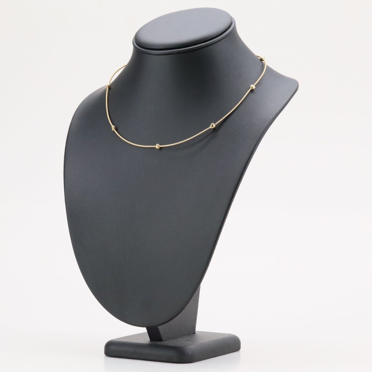 Necklace yellow gold cable and its little golden hearts
