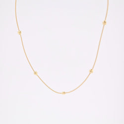 Necklace yellow gold cable and its little golden hearts