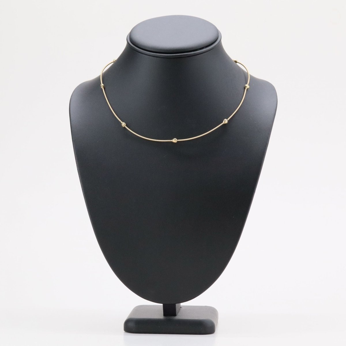 Necklace yellow gold cable and its little golden hearts