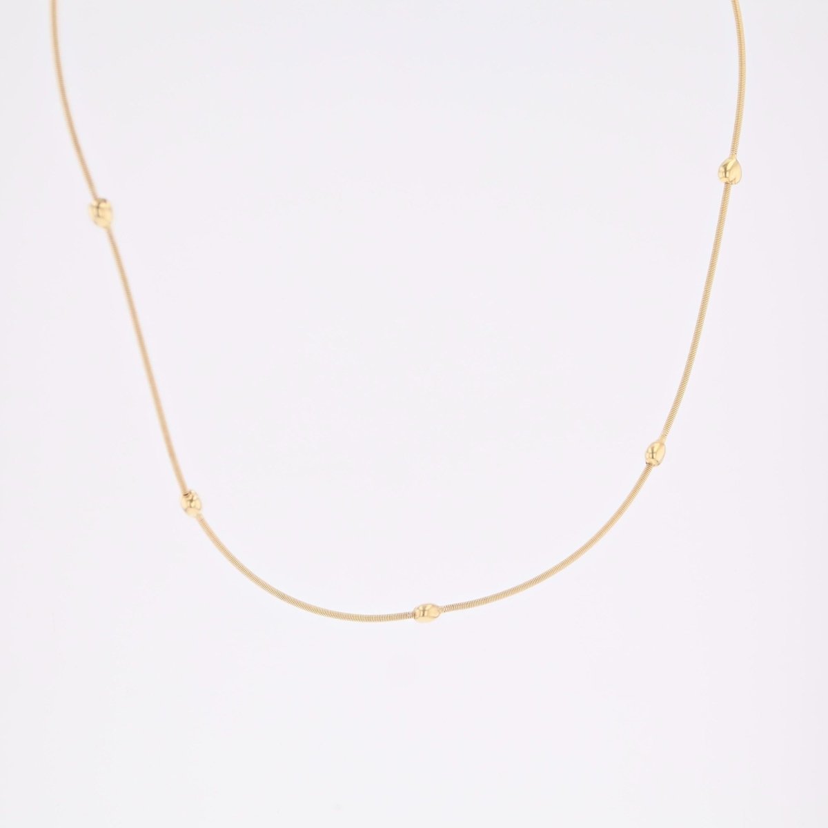 Necklace yellow gold cable and its little golden hearts