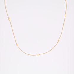 Necklace yellow gold cable and its little golden hearts