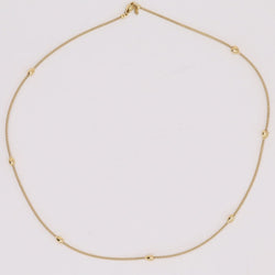 Necklace yellow gold cable and its little golden hearts