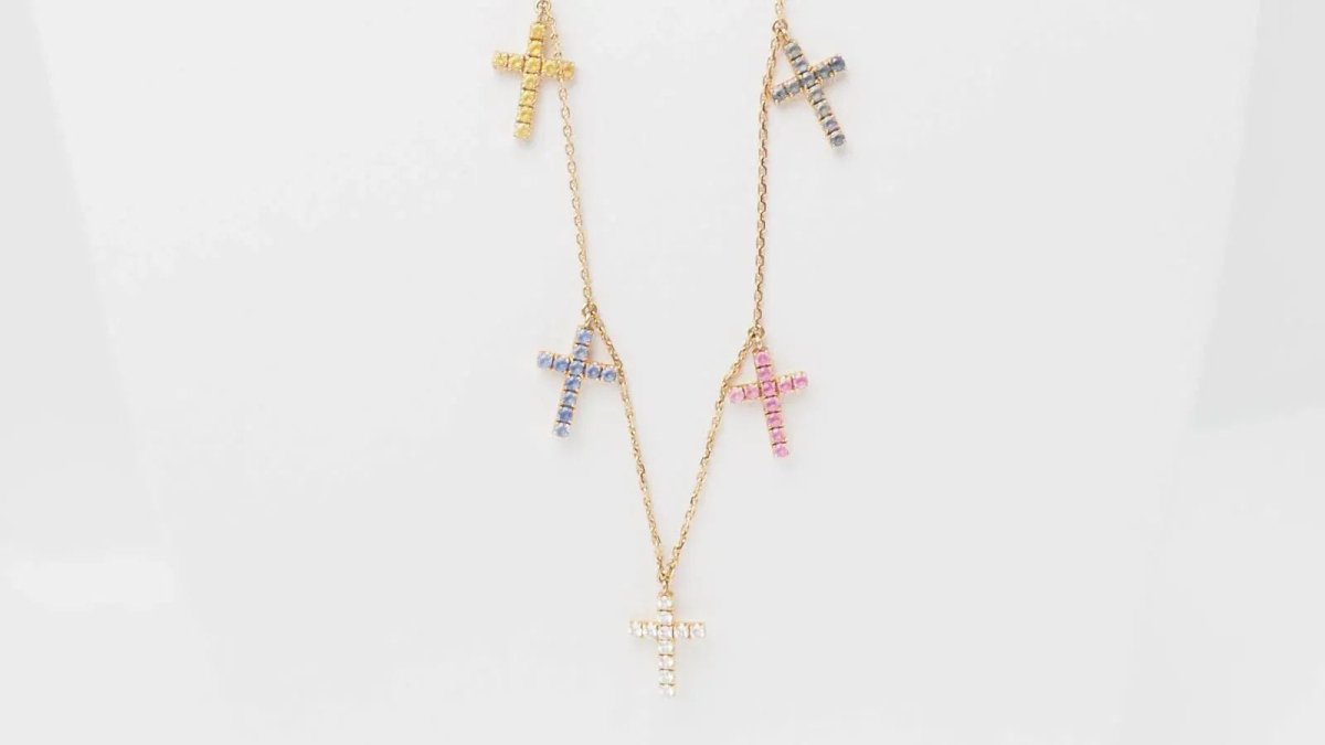 Collier Cartier 11 Croix en or rose, diamants et saphirs de couleurs - Castafiore