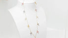 Collier Cartier 11 Croix en or rose, diamants et saphirs de couleurs - Castafiore