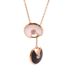 Collier CARTIER en or jaune, onyx et diamants - Castafiore