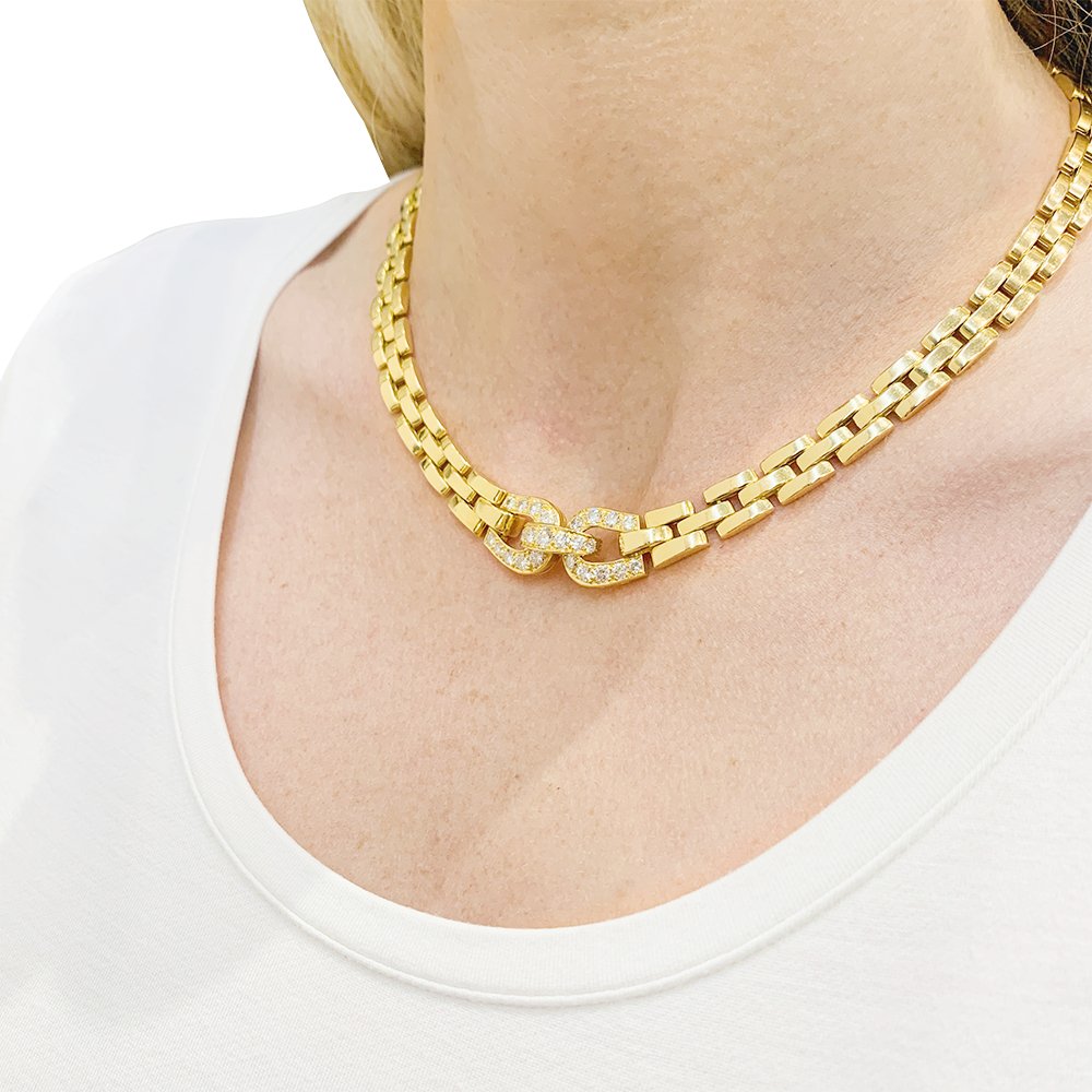 Collier CARTIER "Etrier" en or jaune et diamants - Castafiore