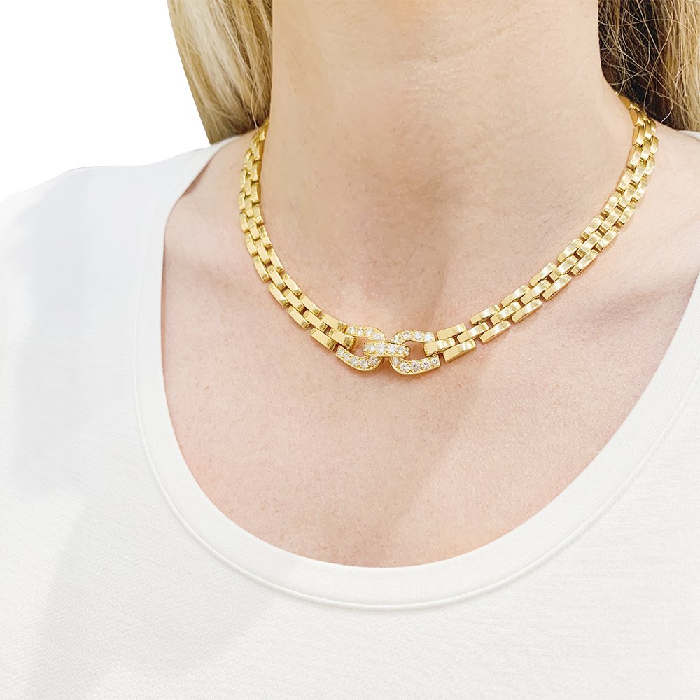 Collier CARTIER "Etrier" en or jaune et diamants - Castafiore