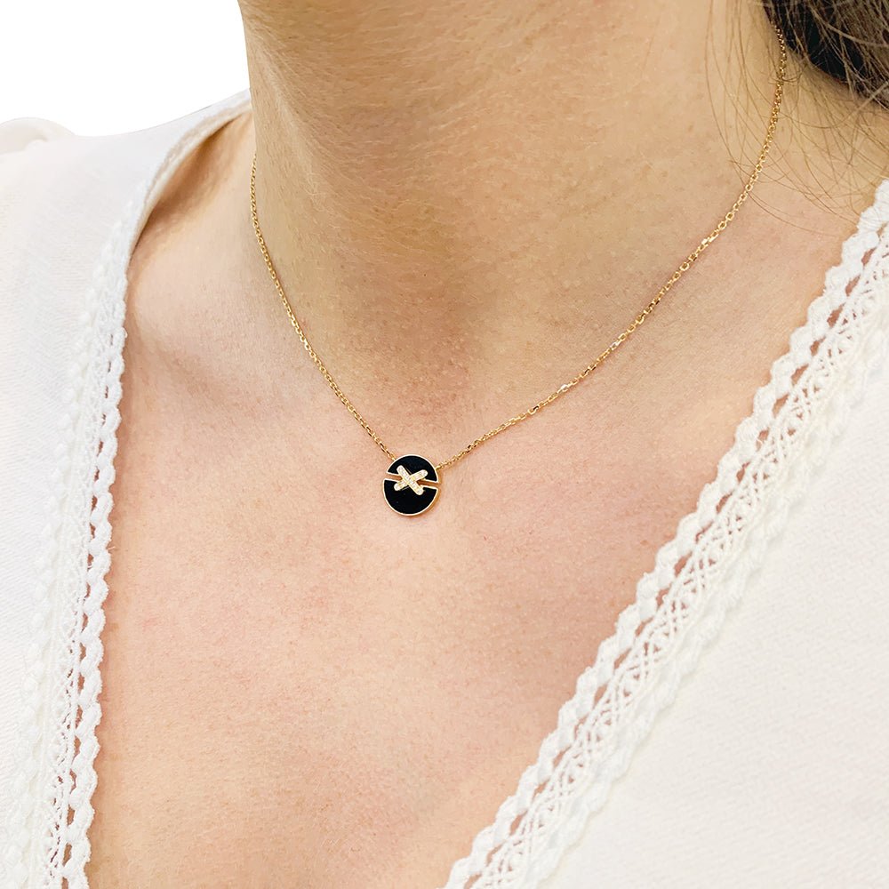 Collier Chaumet ,"Jeux de Liens", or rose, diamants et onyx. - Castafiore