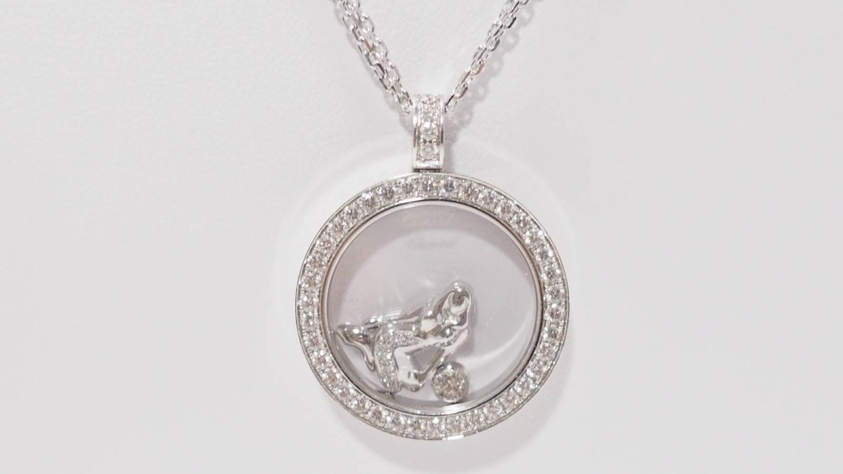 Collier Chopard "happy Diamonds" en or blanc et diamants - Castafiore