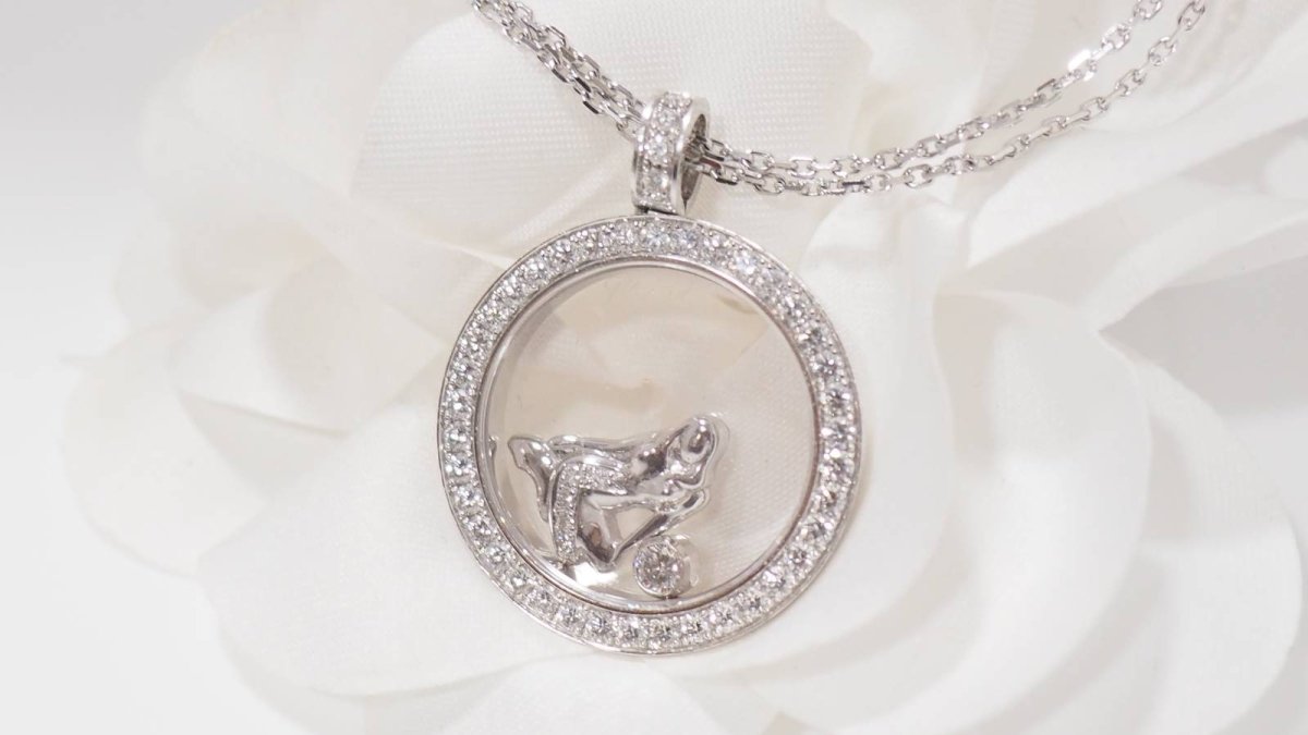 Collier Chopard "happy Diamonds" en or blanc et diamants - Castafiore