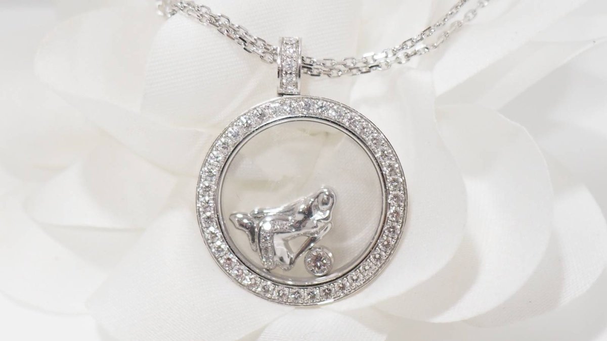 Collier Chopard "happy Diamonds" en or blanc et diamants - Castafiore