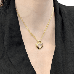 Collier CHOPARD "Happy Diamonds" en or jaune et diamants - Castafiore