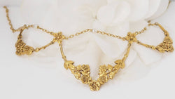 Collier draperie début XIXème siècle en or jaune et perles - Castafiore