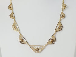 Collier draperie Fin XIXème en or jaune - Castafiore