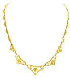 Collier en or 18 carats à décor de filigranes et feuilles, époque 1900