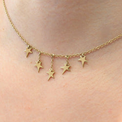 Collier en or jaune à pampilles étoiles - Castafiore