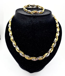 Collier et bracelet en or jaune et blanc 18 carats formant parure - Castafiore