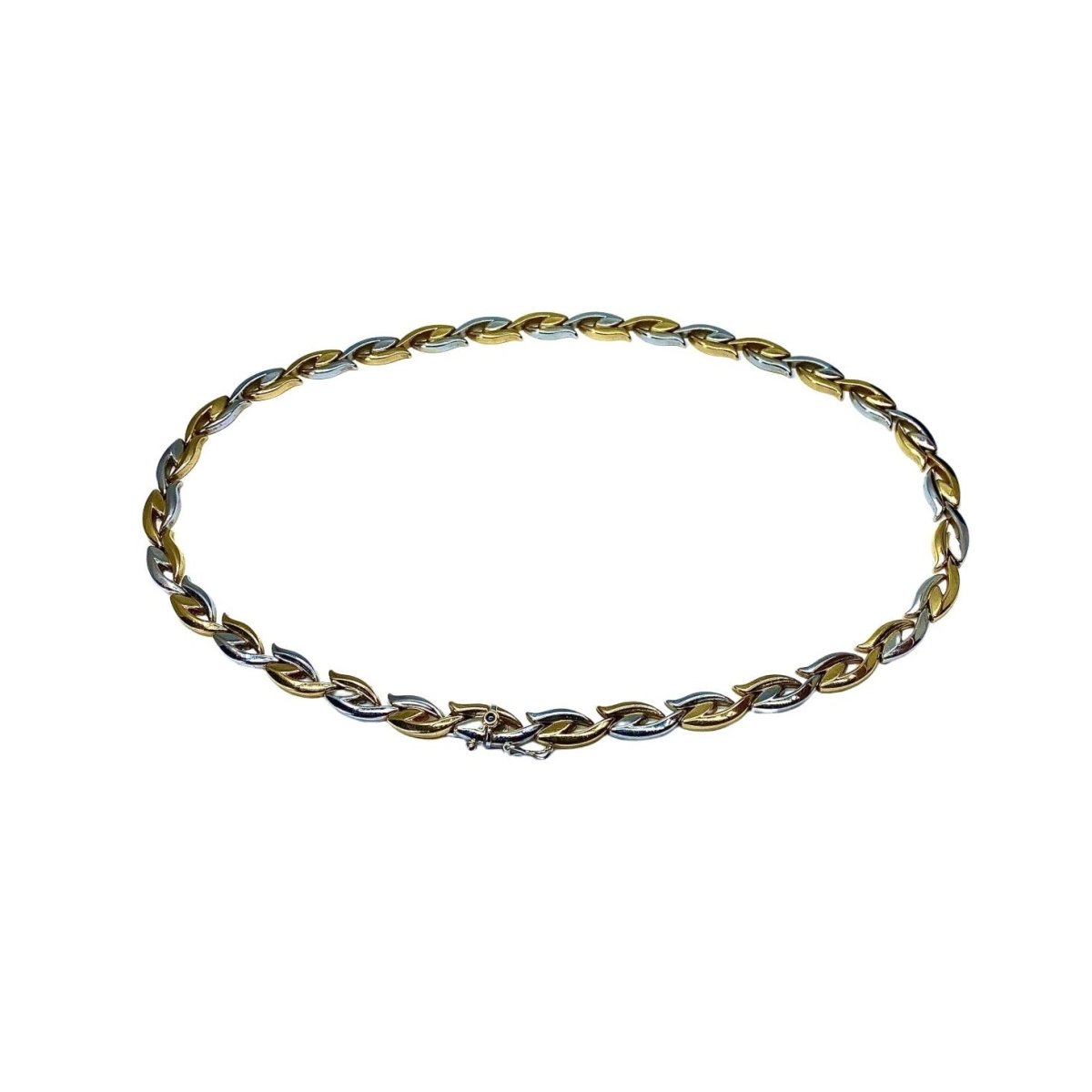 Collier et bracelet en or jaune et blanc 18 carats formant parure - Castafiore