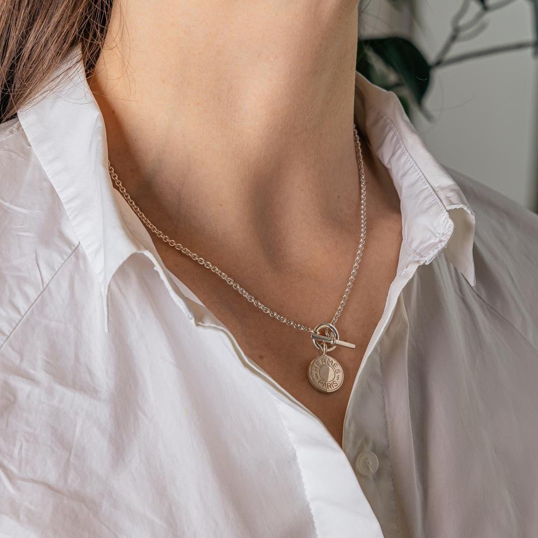 Collier HERMÉS "Ex-Libris" en argent - Castafiore