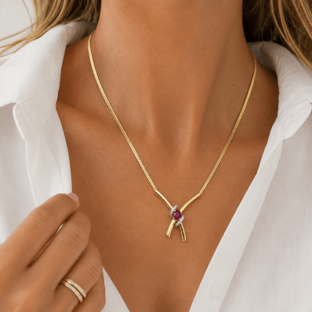 Collier Maille en or jaune, rubis et diamants - Castafiore