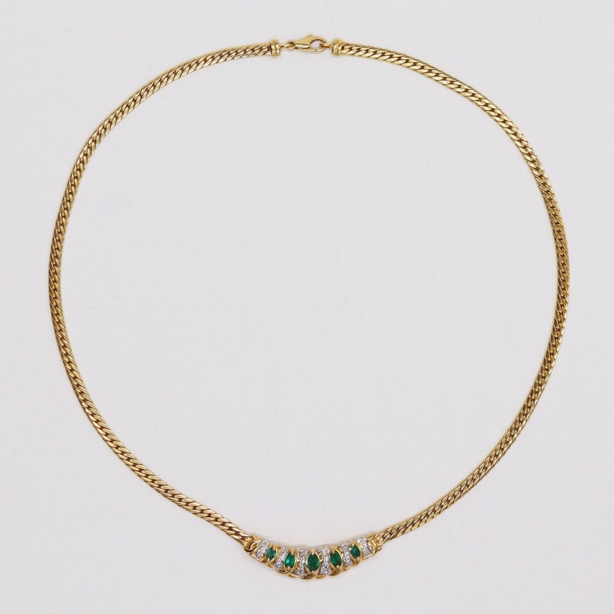 Collier maille gourmette en or jaune et émeraude - Castafiore