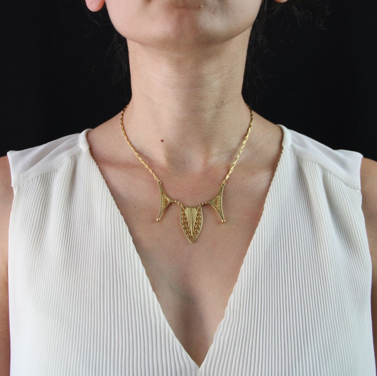 Collier motif filigrané en or jaune - Castafiore