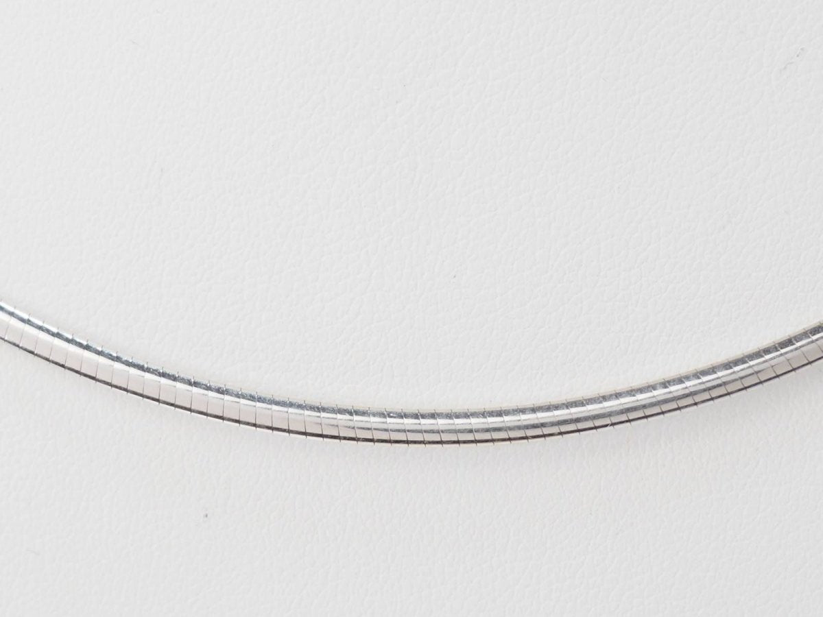 Collier Oméga en or blanc - Castafiore