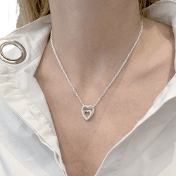 Collier Pendentif CARTIER en or blanc et diamants - Castafiore