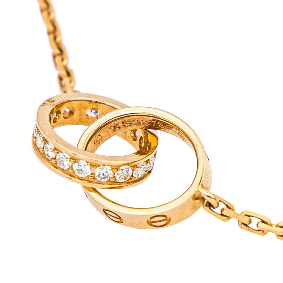 Collier Pendentif CARTIER "Love" en or rose et diamants - Castafiore