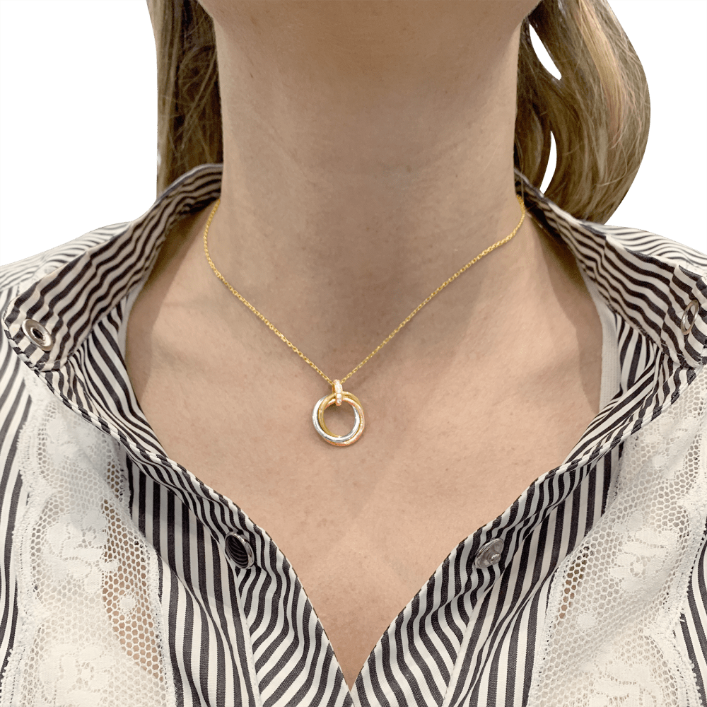 Necklace Cartier, "Trinity", three golds, diamonds.