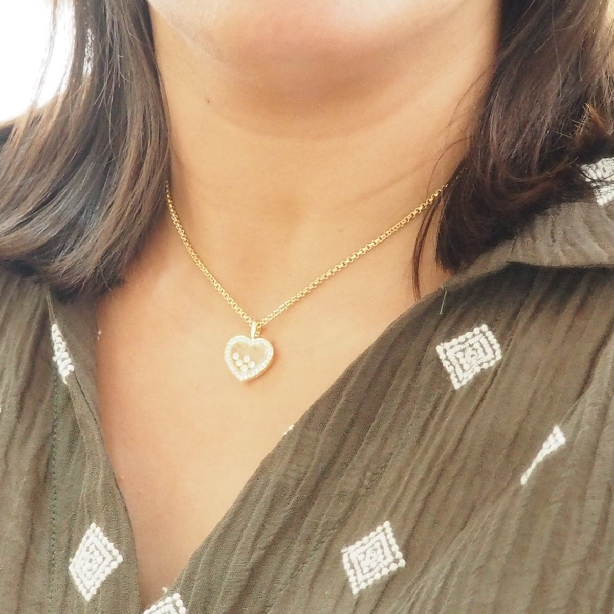 Collier Pendentif CHOPARD "Happy Diamonds" en or jaune et diamants - Castafiore