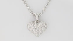 Collier pendentif coeur en or blanc et diamants
