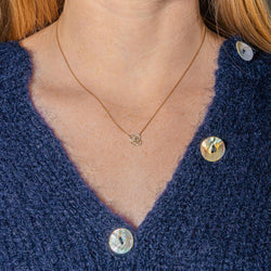 Collier Pendentif DE BEERS "Lotus" en or rose et diamants - Castafiore