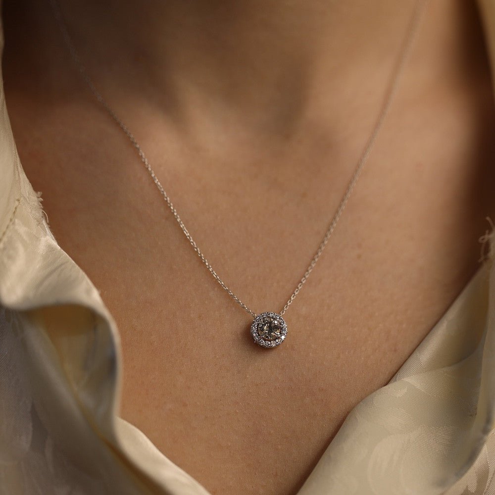 Collier pendentif diamant 0,57 Ct K - VS en or gris 18 Cts. 42 cm. - Castafiore