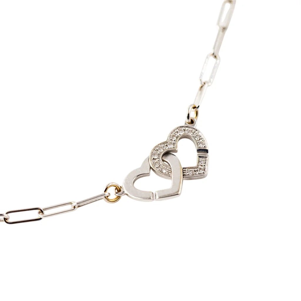 Collier Pendentif DINH VAN "Menottes Double Coeurs R9" en or blanc et diamants - Castafiore
