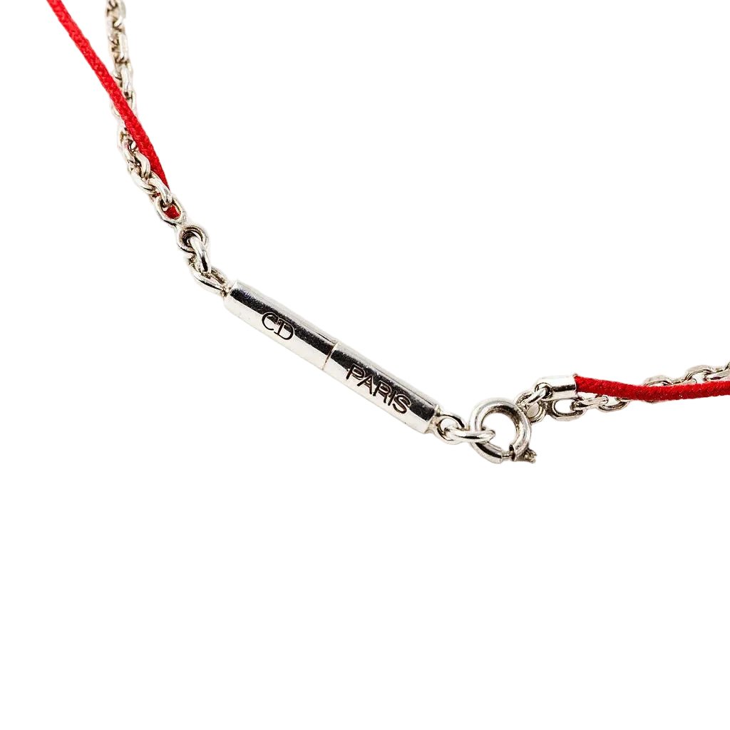 Collier Pendentif DIOR Croix en argent et cordon - Castafiore